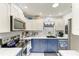 Beautiful kitchen with stainless steel appliances, custom cabinets, and modern countertops at 1906 Canterbury Ln # 16, Sun City Center, FL 33573