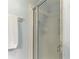 Shower stall with glass doors and white tiling for a clean, modern look at 1906 Canterbury Ln # 16, Sun City Center, FL 33573