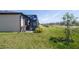 Spacious backyard with a screened patio perfect for outdoor enjoyment at 2016 Bonito Way, Port Charlotte, FL 33953
