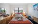 Brightly decorated bedroom with natural light and vibrant decor, creating a comfortable and inviting space at 2016 Bonito Way, Port Charlotte, FL 33953