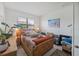 A modern, sunlit bedroom with stylish furnishings and a serene ambiance for relaxation and rest at 2016 Bonito Way, Port Charlotte, FL 33953