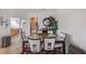 Bright dining room featuring a modern table setting, decor, and natural light at 2016 Bonito Way, Port Charlotte, FL 33953