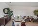 Formal dining room with modern table, seating for six, and elegant decor at 2016 Bonito Way, Port Charlotte, FL 33953