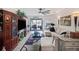 Spacious living room with elegant decor, comfortable seating, and large windows offering plenty of light at 2016 Bonito Way, Port Charlotte, FL 33953