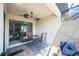 Cozy screened patio with a ceiling fan and an outdoor dining area at 2016 Bonito Way, Port Charlotte, FL 33953