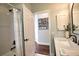 Bathroom featuring a shower/tub combo, vanity and modern lighting at 2149 Muskogee Trl, Nokomis, FL 34275