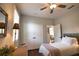 Bedroom with closet, ceiling fan and shuttered windows at 2149 Muskogee Trl, Nokomis, FL 34275