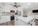 Bright and modern kitchen featuring a marble island, stainless appliances, and an open floor plan at 2255 61St St, Sarasota, FL 34243