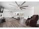 Spacious living room featuring modern decor, neutral color palette, recessed lighting, and vinyl plank flooring at 2255 61St St, Sarasota, FL 34243