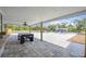 Covered patio featuring view of the pool, tiki bar, fire pit and lots of room at 2255 61St St, Sarasota, FL 34243