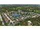 Aerial view of a charming community with a central pond and well-maintained homes at 2334 50Th Street E Cir, Palmetto, FL 34221