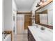Bathroom with double sinks, and a shower-tub combo at 2334 50Th Street E Cir, Palmetto, FL 34221