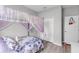 Cozy secondary bedroom with a whimsical canopy bed and neutral walls at 2334 50Th Street E Cir, Palmetto, FL 34221