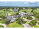 Aerial view of the community showcasing the golf course, lakes, and meticulously maintained grounds at 2914 Dick Wilson Dr, Sarasota, FL 34240