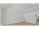 Large bedroom with hardwood floors, a ceiling fan, and a connecting door to the en-suite bathroom at 2914 Dick Wilson Dr, Sarasota, FL 34240