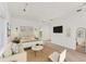 Bright, spacious bedroom with king bed, sitting area and decorative wall art at 2914 Dick Wilson Dr, Sarasota, FL 34240