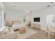 Bright bedroom features a king bed, sitting area and a door leading to the backyard at 2914 Dick Wilson Dr, Sarasota, FL 34240