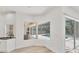 Charming breakfast nook with a view of the pool and outdoor living space at 2914 Dick Wilson Dr, Sarasota, FL 34240