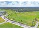 Expansive driving range with meticulously maintained greens and fairways, perfect for practicing your swing at 2914 Dick Wilson Dr, Sarasota, FL 34240
