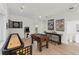 Spacious game room features fun games, including shuffleboard, foosball, darts, and arcade at 2914 Dick Wilson Dr, Sarasota, FL 34240