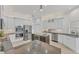 Gourmet kitchen featuring stainless steel appliances, a center island, and custom cabinetry at 2914 Dick Wilson Dr, Sarasota, FL 34240