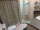 Bathroom with tile flooring, shower, and modern toilet at 3060 Courtland St, Sarasota, FL 34237