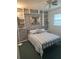 Charming bedroom featuring unique decor and a comfortable bed with accent pillows at 3060 Courtland St, Sarasota, FL 34237