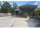 Outdoor area featuring a large covered parking area with ample space for vehicles at 3060 Courtland St, Sarasota, FL 34237