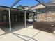 Beautiful backyard patio with a hot tub and outdoor dining area at 3060 Courtland St, Sarasota, FL 34237