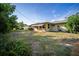 Expansive backyard with lush greenery and ample space for outdoor activities at 3468 Roslyn Rd, Venice, FL 34293