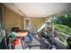 Cozy enclosed porch offering extra space for relaxation or hobbies at 3468 Roslyn Rd, Venice, FL 34293
