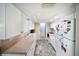 Efficient kitchen layout with white cabinets, a double sink, and modern appliances at 3468 Roslyn Rd, Venice, FL 34293