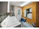 Functional laundry room with washer, dryer, and storage space for added convenience at 3468 Roslyn Rd, Venice, FL 34293