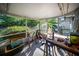 Bright, airy screened porch with views of the lush backyard at 3468 Roslyn Rd, Venice, FL 34293