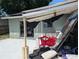 Damaged exterior with debris and damaged structure, in need of repair and restoration at 3646 Lakewood Dr, Sarasota, FL 34232