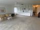 Bright living room with a large built-in bookshelf and storage, perfect for organizing and displaying decor at 3673 Somerville Dr # 1510, Sarasota, FL 34232