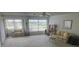 Spacious living room with large windows that provide plenty of natural light at 3673 Somerville Dr # 1510, Sarasota, FL 34232