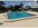 Inviting community pool with clear blue water and ample lounging space at 3673 Somerville Dr # 1510, Sarasota, FL 34232