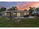Outdoor patio area at sunset at 4076 Vana Dr, Sarasota, FL 34241