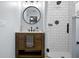The bathroom features a granite vanity and a tiled shower with glass door at 4076 Vana Dr, Sarasota, FL 34241