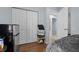 This bedroom has wood floors, blue walls, a closet, and is partially visible in this shot at 4076 Vana Dr, Sarasota, FL 34241