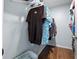 Walk-in closet providing ample storage, and laminate flooring at 4076 Vana Dr, Sarasota, FL 34241