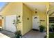 Inviting front entrance with well-manicured plants, garage, and the house number displayed at 4076 Vana Dr, Sarasota, FL 34241
