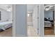 Hallway view showing bedrooms and bathroom with tub at 4076 Vana Dr, Sarasota, FL 34241