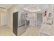 Updated kitchen with stainless steel appliances, including a refrigerator and oven at 4155 Center Gate Blvd, Sarasota, FL 34233