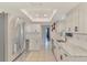 Bright kitchen featuring white cabinets, stainless steel appliances, and modern countertops at 4155 Center Gate Blvd, Sarasota, FL 34233