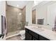 Modern bathroom features a sleek glass shower, stylish vanity, and elegant fixtures at 4430 Pond Brook Ct, Bradenton, FL 34211