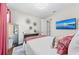This bedroom offers a comforting decor, decorative wall art, and a television with scenic display at 4430 Pond Brook Ct, Bradenton, FL 34211
