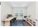 Bright office space with water views, a modern desk, and stylish furnishings perfect for remote work at 4430 Pond Brook Ct, Bradenton, FL 34211