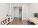 Bright office features French doors leading to the staircase, and modern desk creating a functional work area at 4430 Pond Brook Ct, Bradenton, FL 34211